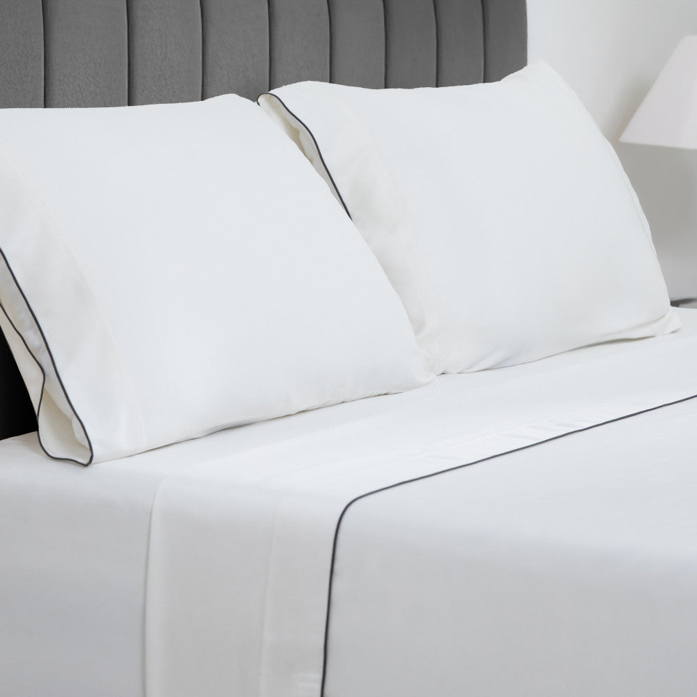 Resort Bamboo Bed Sheets by Cariloha — White/Navy Merrow Edge